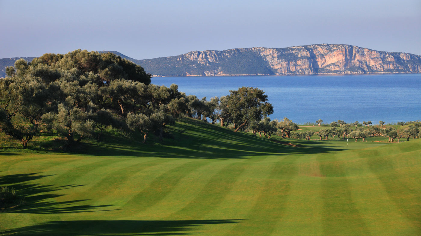 costa navarino bay with golf course in the foreground and sea in the background