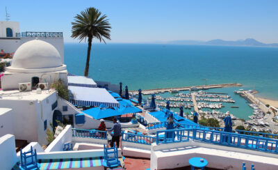 picture overlooking tunisia bay from a white and blue coffee place