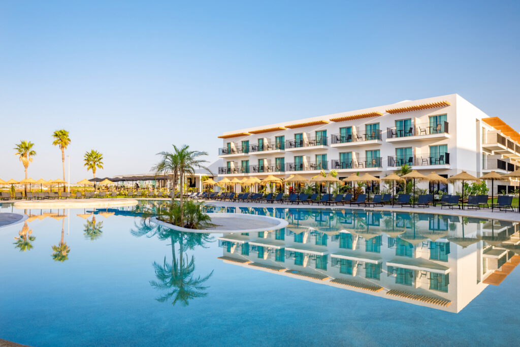 Outdoor pool and exterior of AP Cabanas Beach & Nature Resort