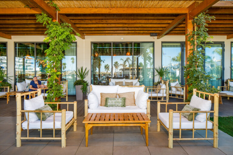 Outdoor seating at AP Cabanas Beach & Nature Resort