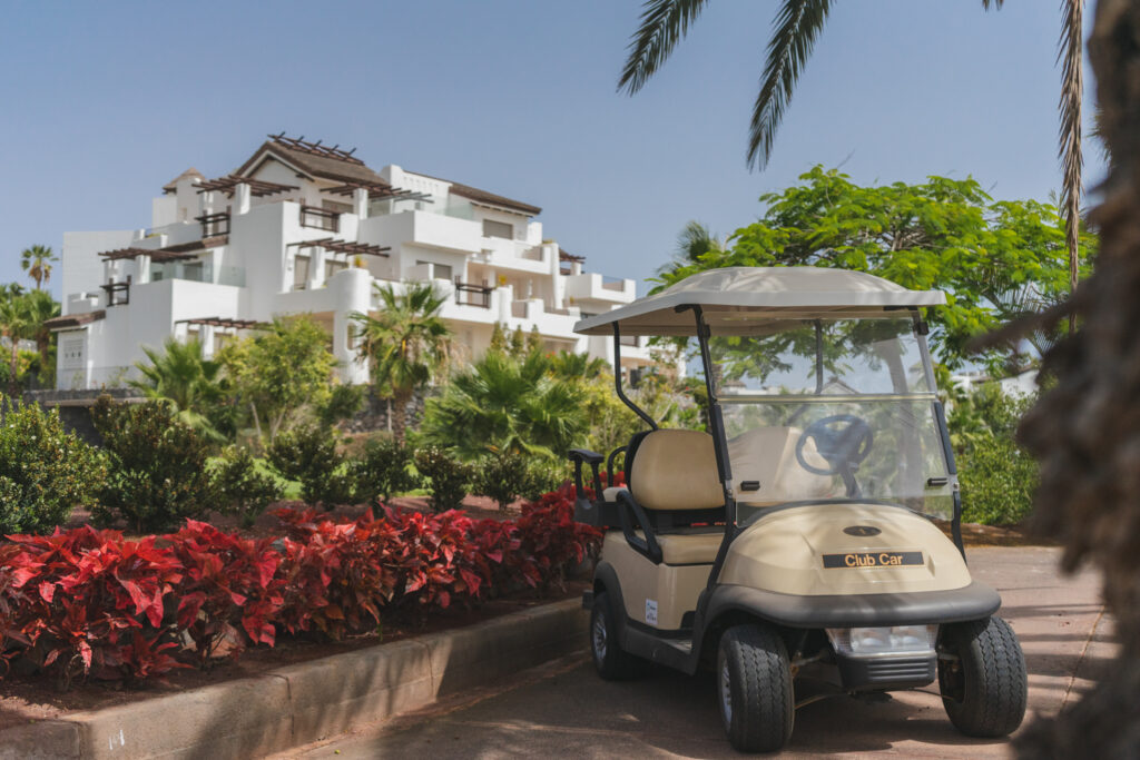 Buggy at Abama Golf Course with building in background