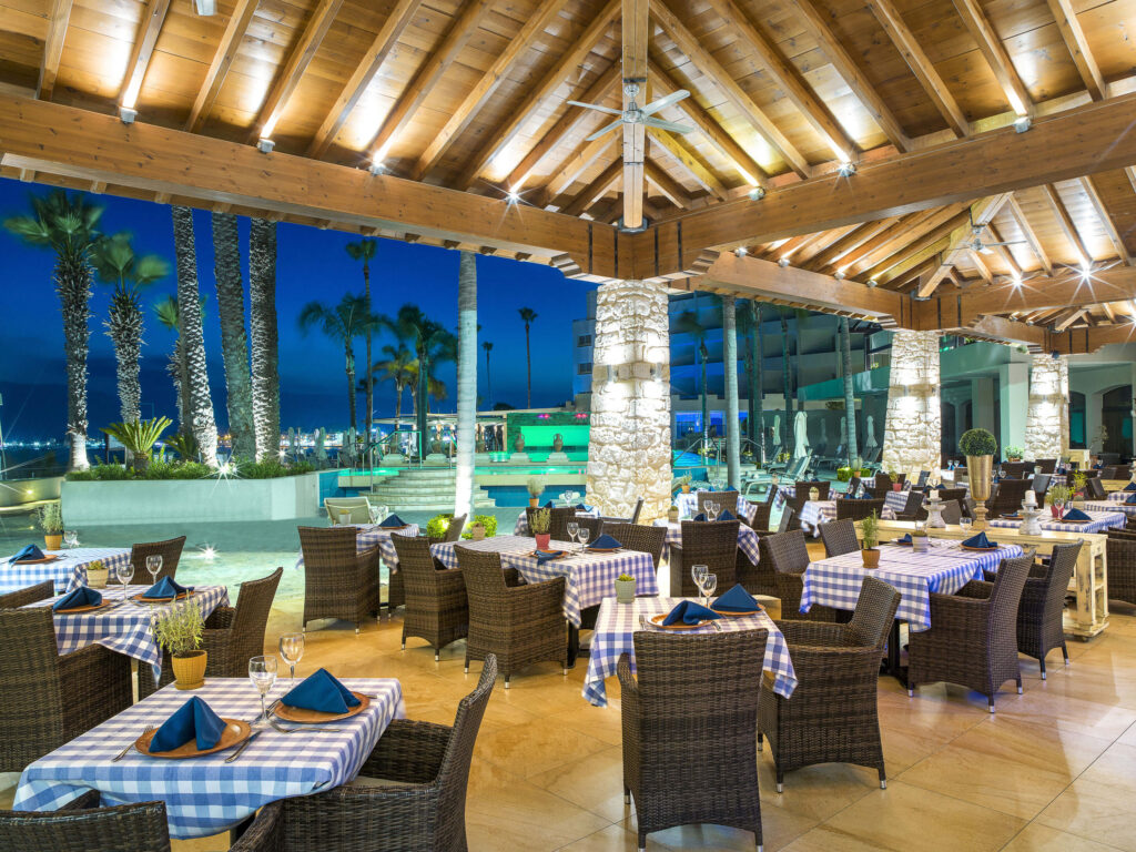 Outdoor dining at Alexander The Great Beach Hotel