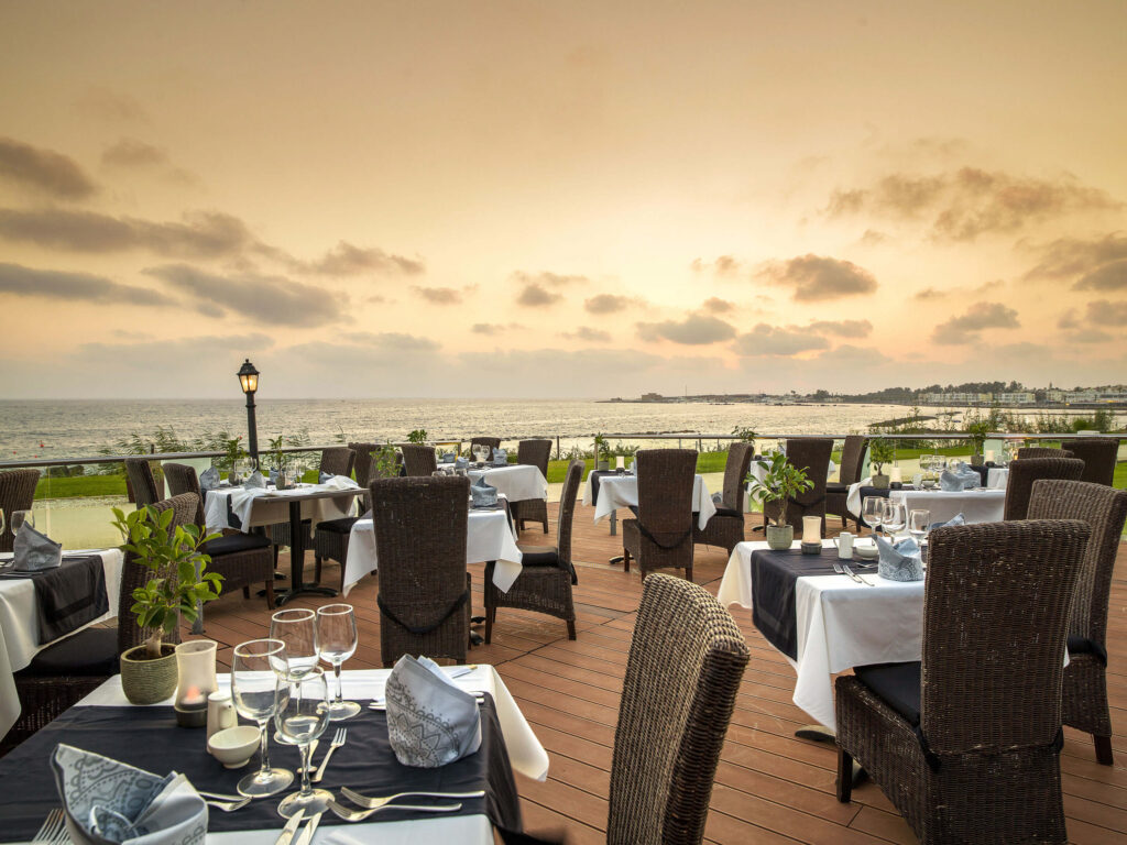 Outdoor dining at Alexander The Great Beach Hotel