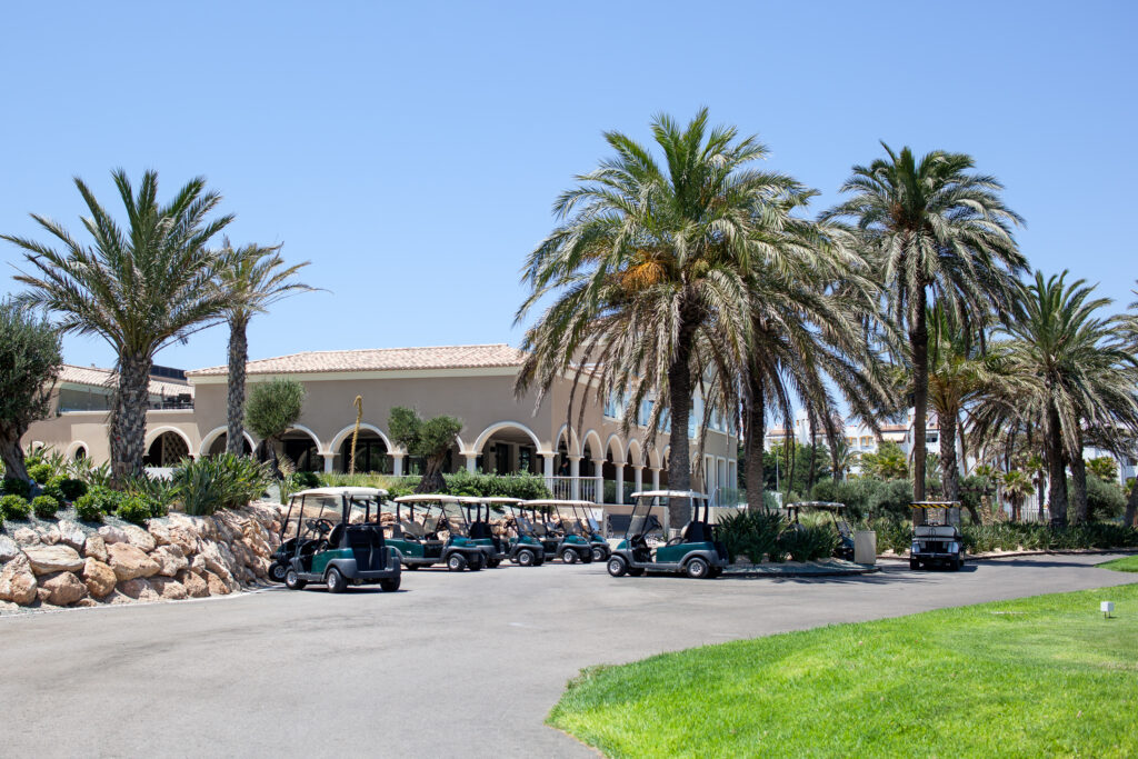 Clubhouse at Almerimar Golf Course with buggies