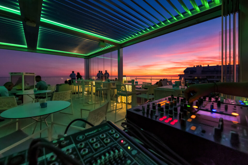 Amare Beach rooftop bar DJ booth.