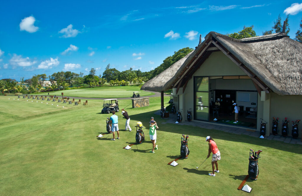 People using the driving range at Anahita Golf Course