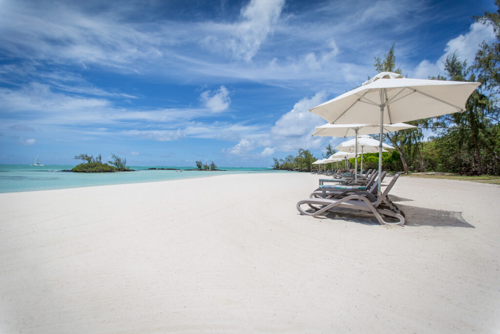 A white sandy beach at Anahita Golf & Spa Resort in Mauritius.