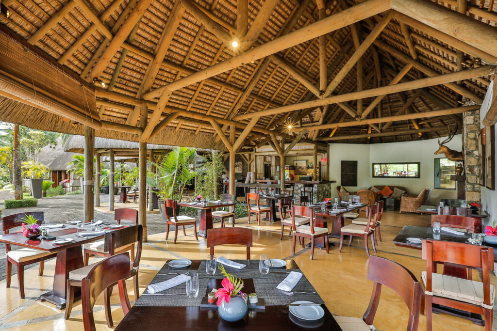 A daytime picture of the dining room at Anahita Golf & Spa Resort in Mauritius.
