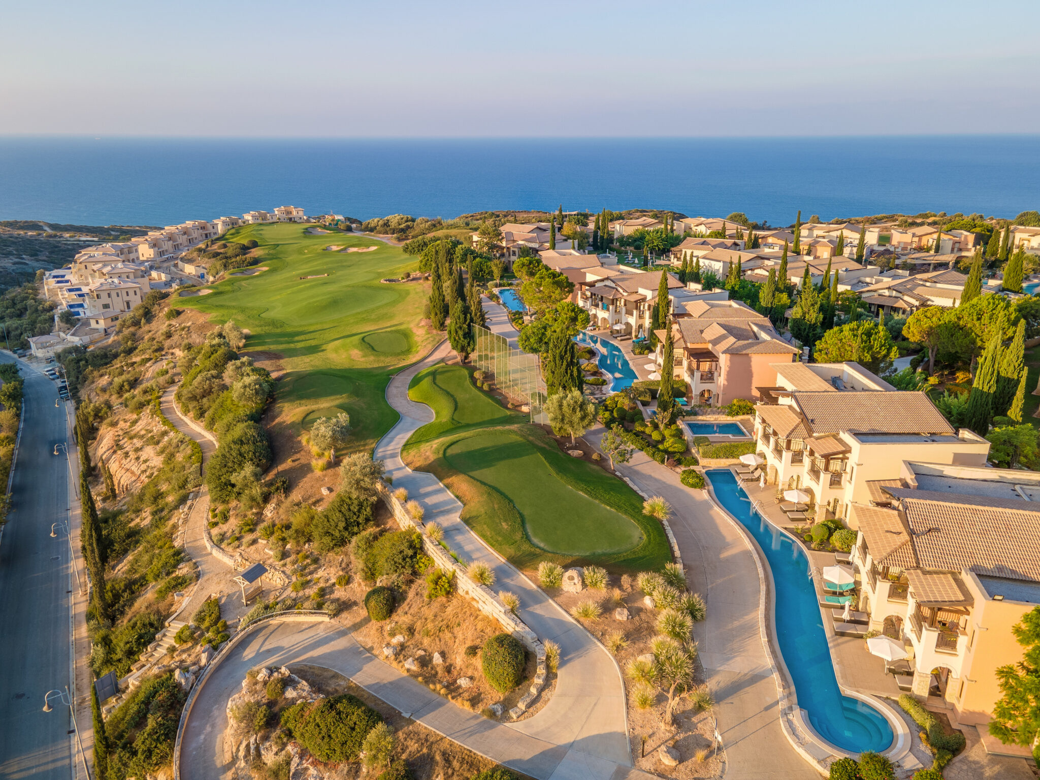 Aerial view of Aphrodite Hills Hotel with golf course