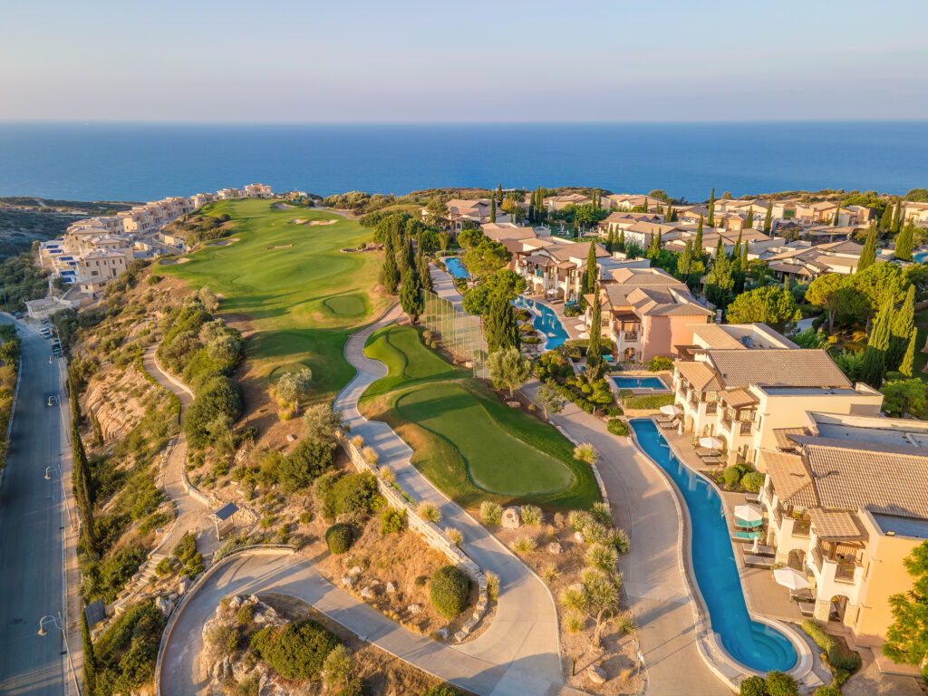 Aerial view of Aphrodite Hills PGA National Cyprus with villas and ocean view