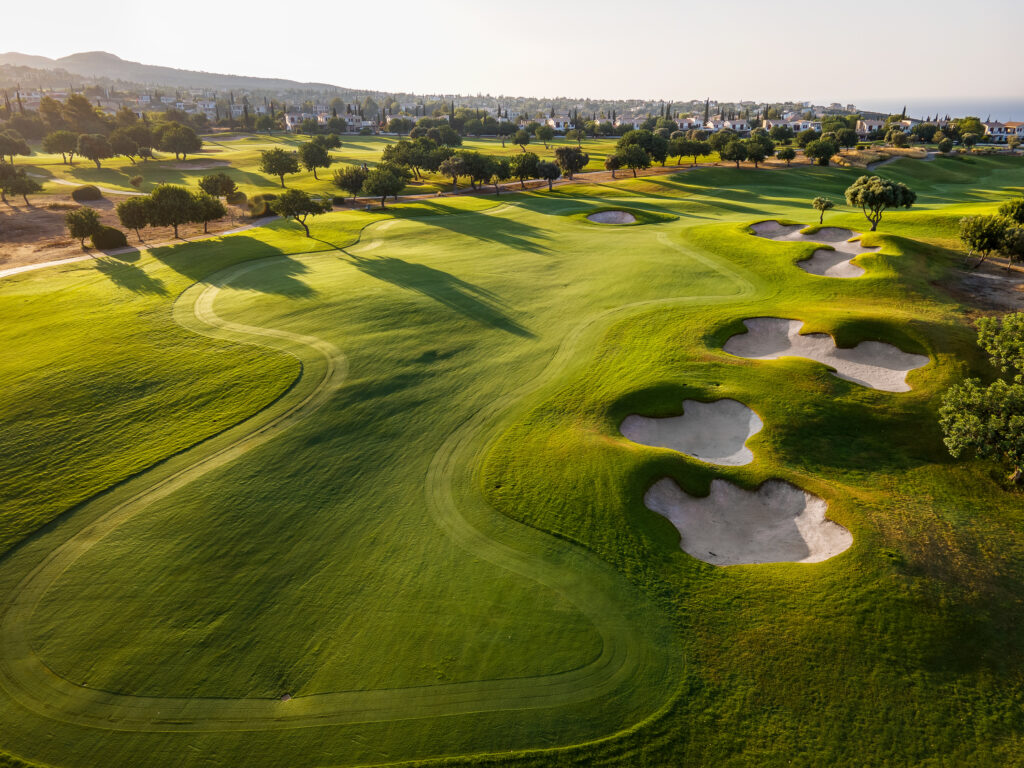 Bunkers on fairway at Aphrodite Hills PGA National Cyprus with trees around