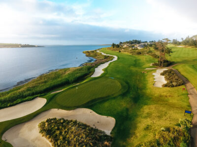 Aerial view of a hole with bunkers at Arabella Country Estate with ocean view