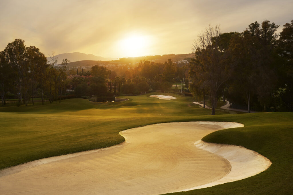 Bunker on fairway at Atalaya - Old Golf Course at sunset