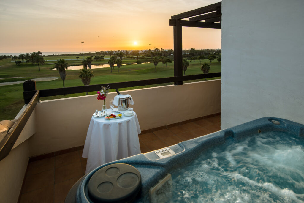 Hot tub on balcony with champagne at Barcelo Costa Ballena Golf & Spa