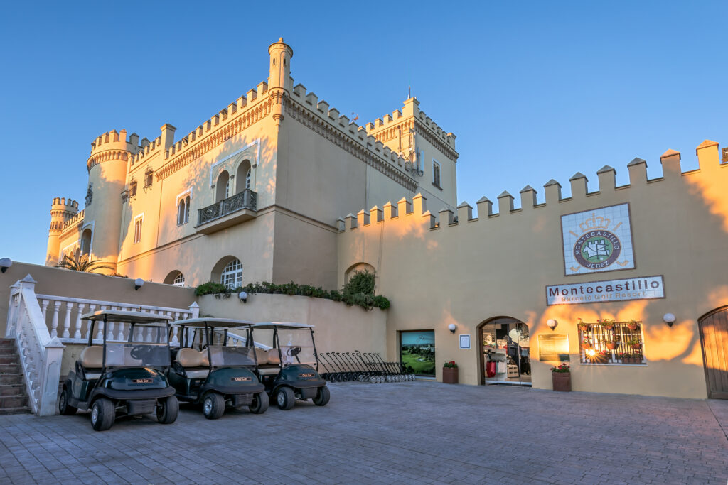 Pro shop at Barcelo Montecastillo Hotel with buggies parked outside