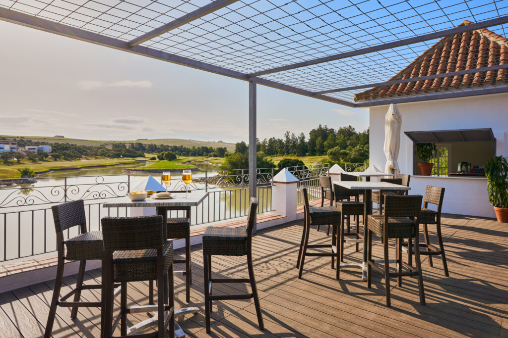 Outdoor bar at Barcelo Montecastillo Hotel with view of lakes