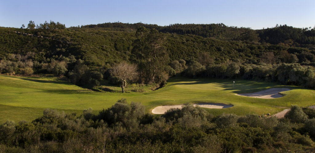 Fairway with bunkers and hill in background at Belas Clube de Campo Golf Course