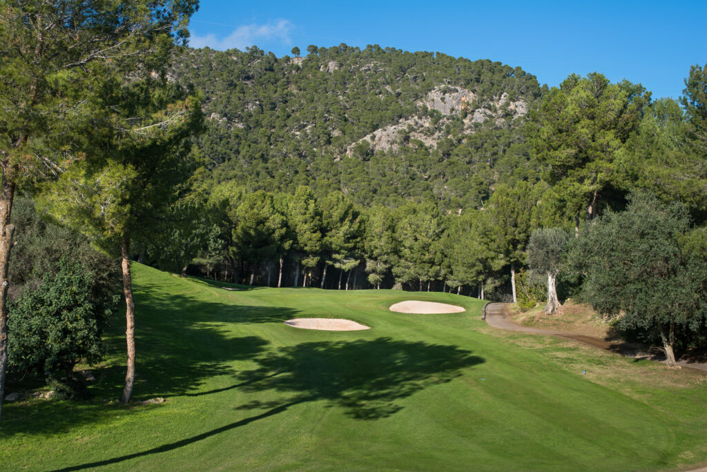 Bunkers on fairway with trees around at Bendinat Golf Course