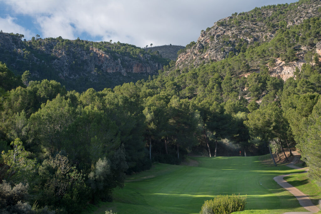 Fairway with trees around and hills at Bendinat Golf Course