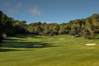 Fairway with bunkers and trees around at Bendinat Golf Course