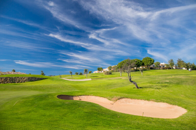 Fairway with bunkers and trees at Boavista Golf Course