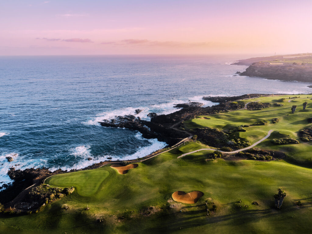 Aerial view of fairway with ocean view at sunset at Buenavista Golf Course