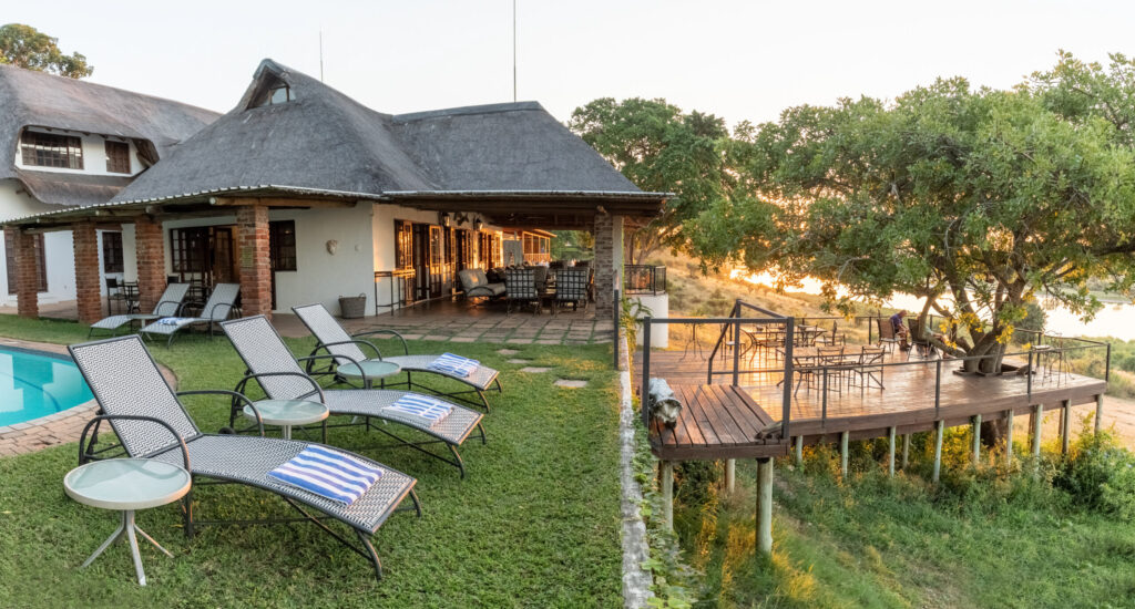 Outdoor sun lounger seating at Buhala Lodge