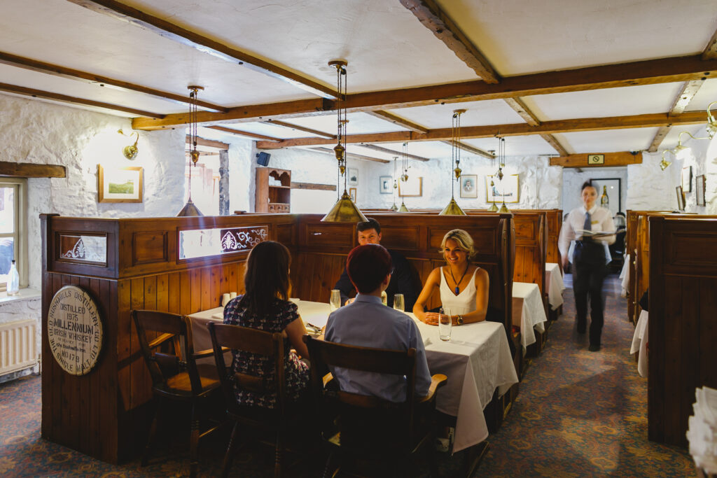 People dining at the restaurant at The Bushmills Inn