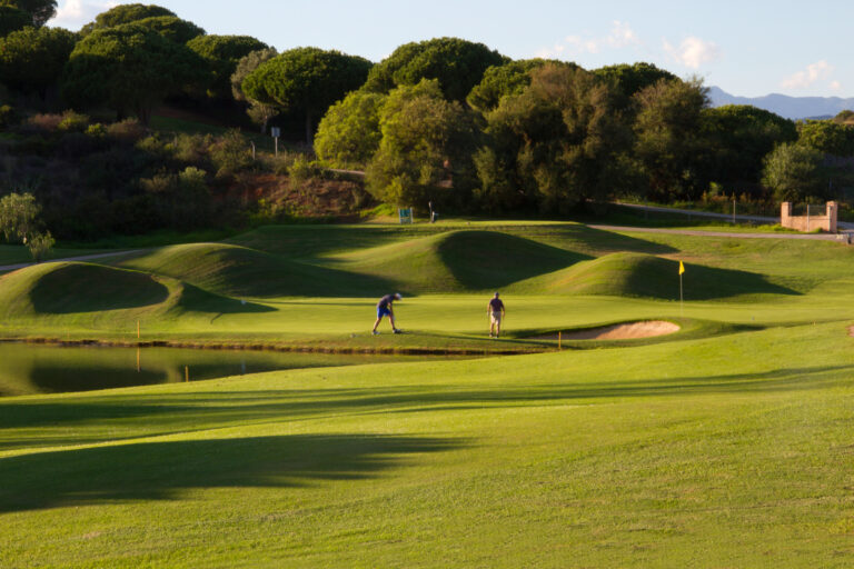 People playing golf at Cabopino Golf Course