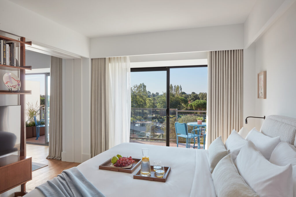 Double bed accommodation with balcony at Camiral Golf & Wellness