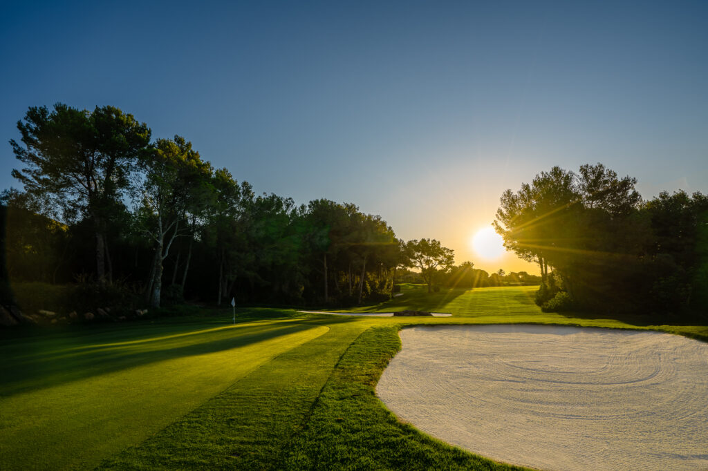 Bunkers on fairway with trees around at Capdepera Golf Course