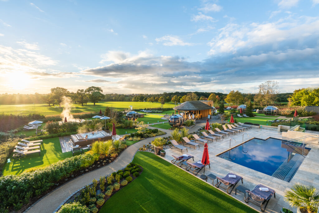 Outdoor pool and hot tub at Carden Park Golf Resort