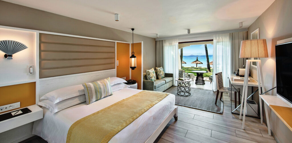 Double bed accommodation at Constance Belle Mare Plage with private patio