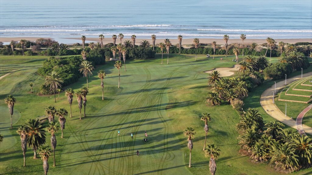 Aerial view of the fairway at Costa Ballena Ocean Golf Club with beach view