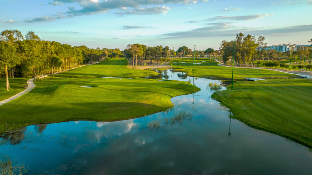 Lake on fairway with trees around at Cullinan - Aspendos Golf Course