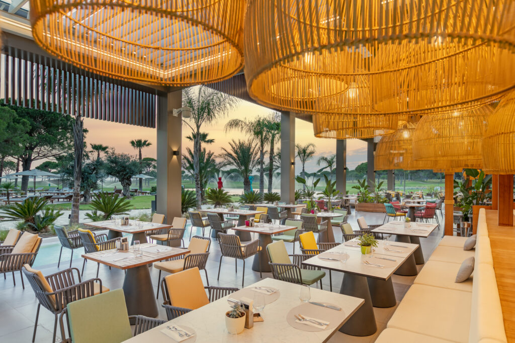 Outdoor restaurant area with views out to the golf course
