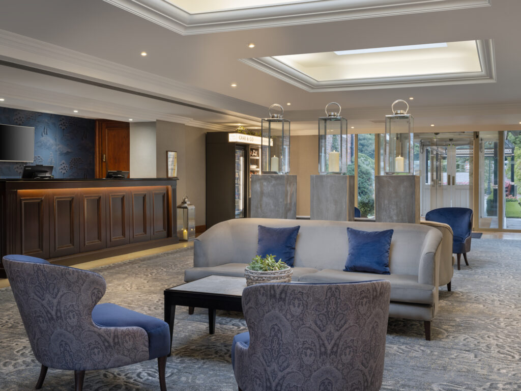 Reception area seating at Delta Hotels By Marriott Worsley Park Country Club