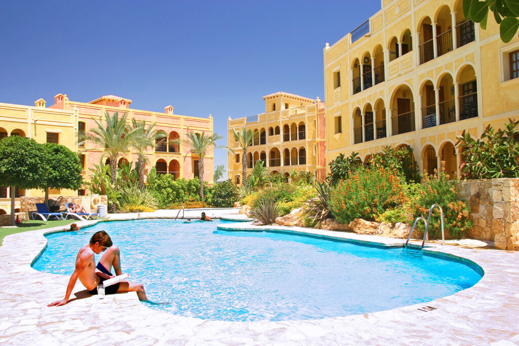 Outdoor pool and exterior of Desert Springs The Lodge Hotel