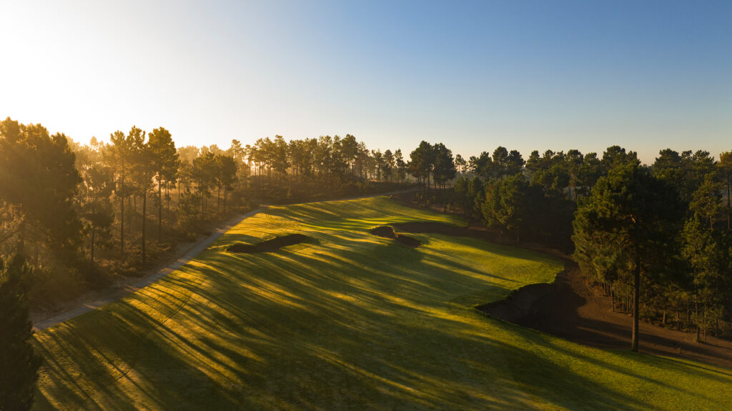 The sun casting shadows over Dunas Comporta golf course