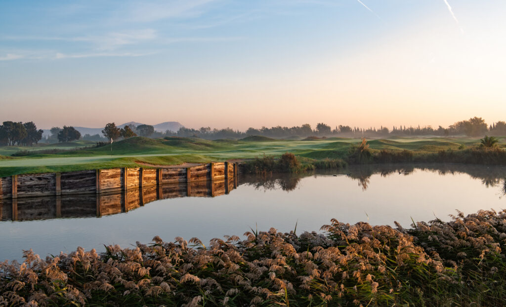 Lake with fairway in background at Emporda - Links Course