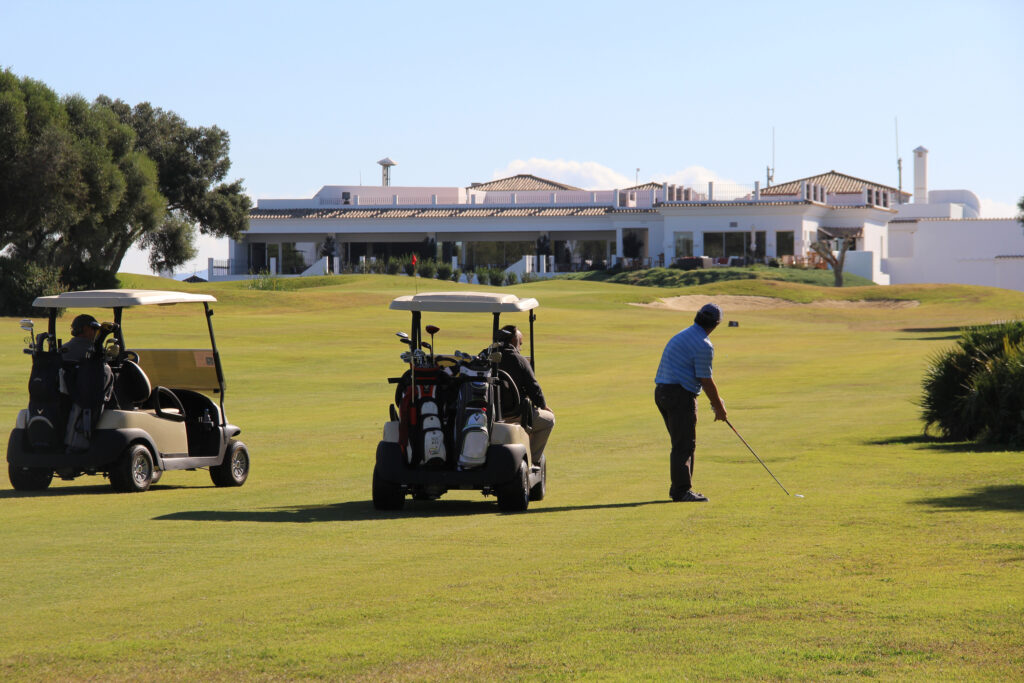 Buggy with people playing golf at Fairplay Golf Club