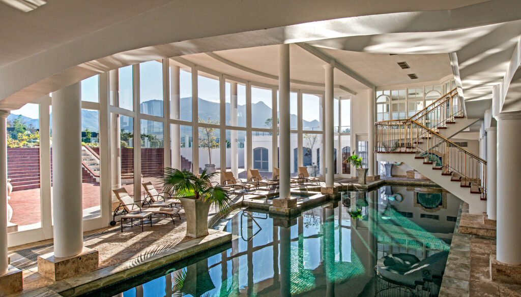 Indoor pool at Fancourt Hotel with loungers