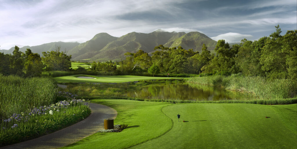 Tee box at Fancourt - Montagu with lake and trees around