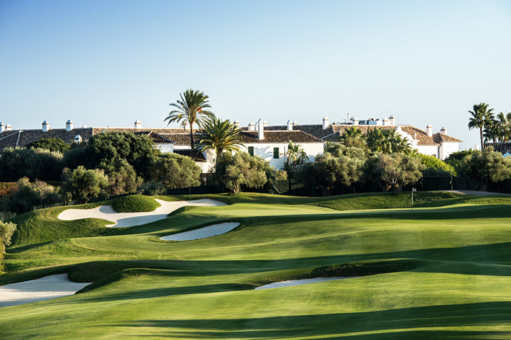 Hole with bunkers around at Finca Cortesin Golf Course