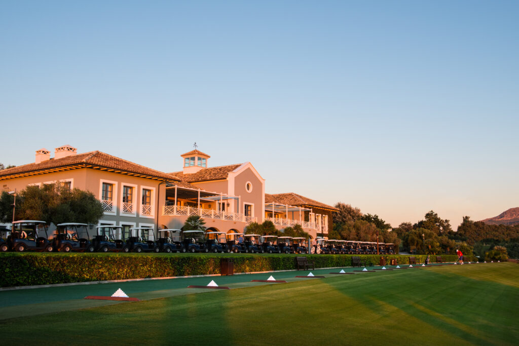 Clubhouse and driving range at Finca Cortesin Golf Course