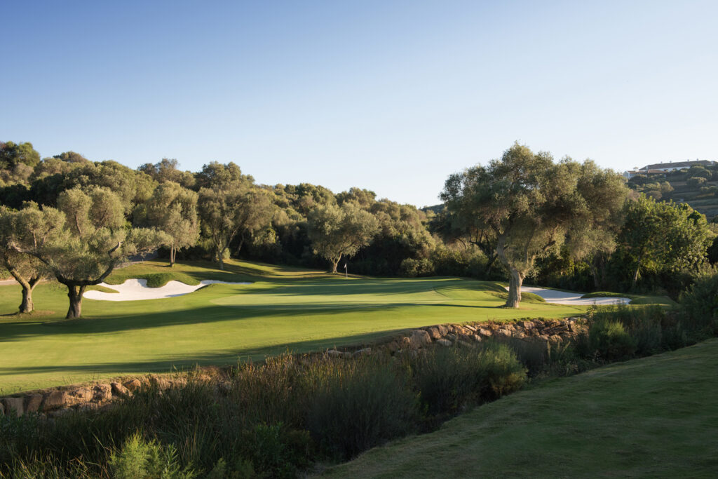 Fairway with trees and bunkers at Finca Cortesin Golf Course