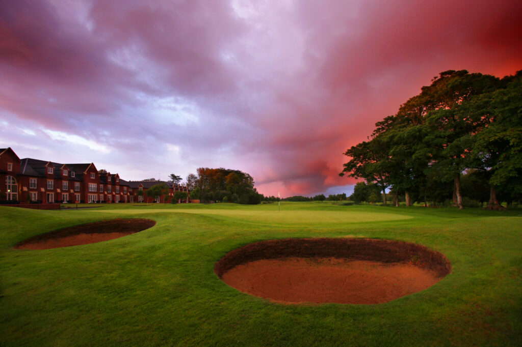 Hole with bunkers at Formby Hall Golf Resort & Spa at sunset