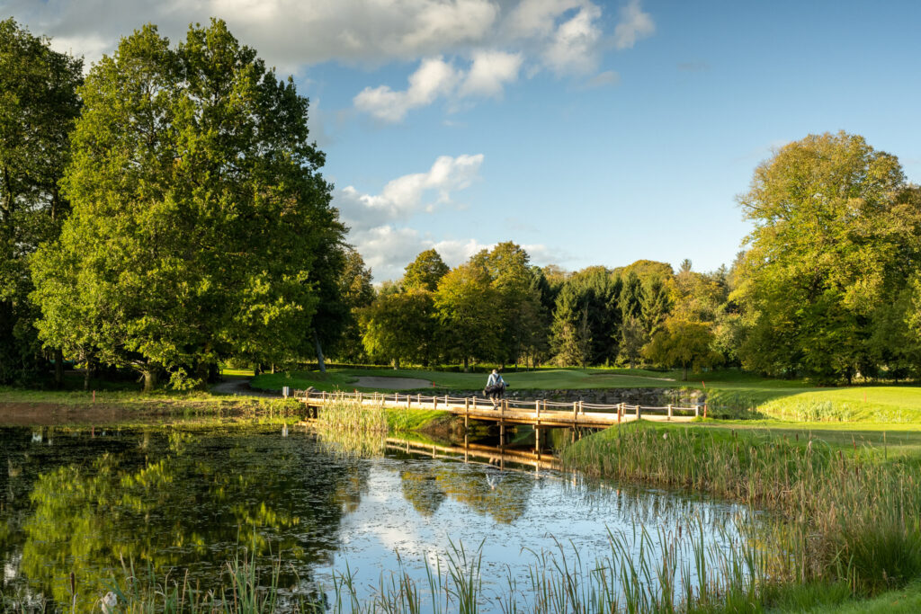 Lake with bridge on fairway at Galgorm Championship Course