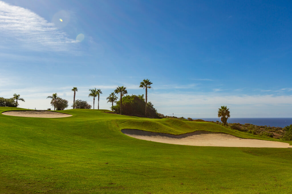 Bunkers on fairway with trees around at Golf Costa Adeje