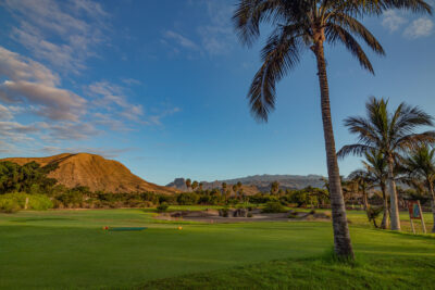 Fairway with trees around and hills in background at Golf Los Palos